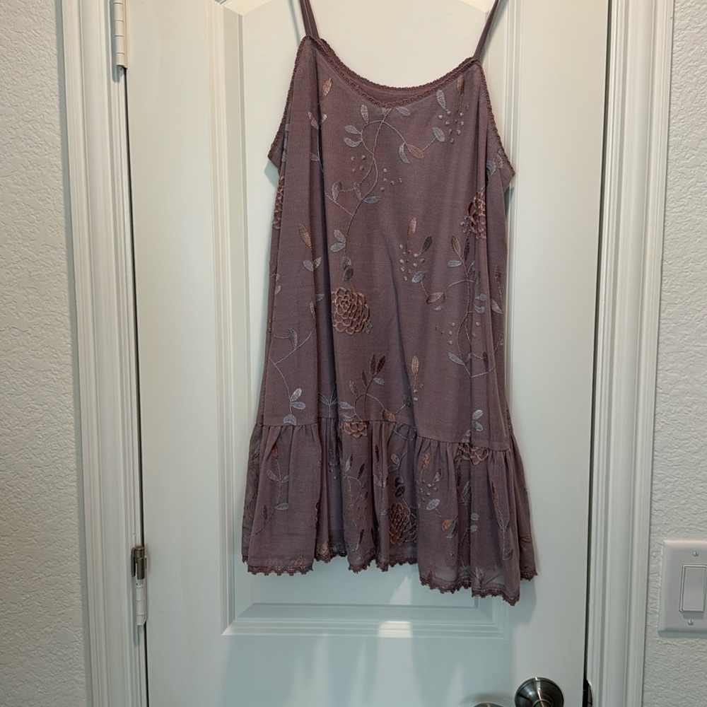 Adorable logo sleeveless layering tank with ruffle bottom, beautiful plum color